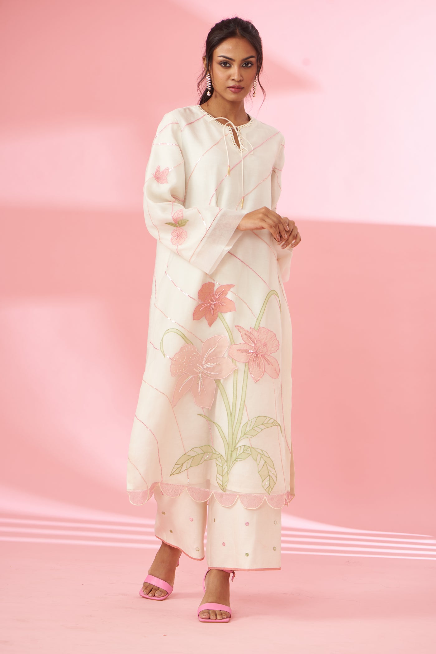 Colorful floral applique work and hand embroidered suit set