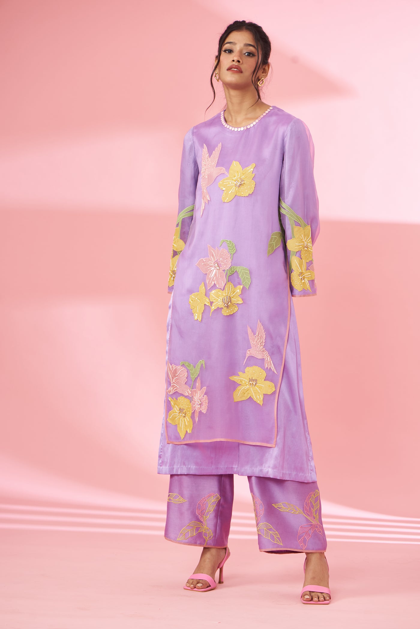 Colorful floral applique work and hand embroidered kurta set
