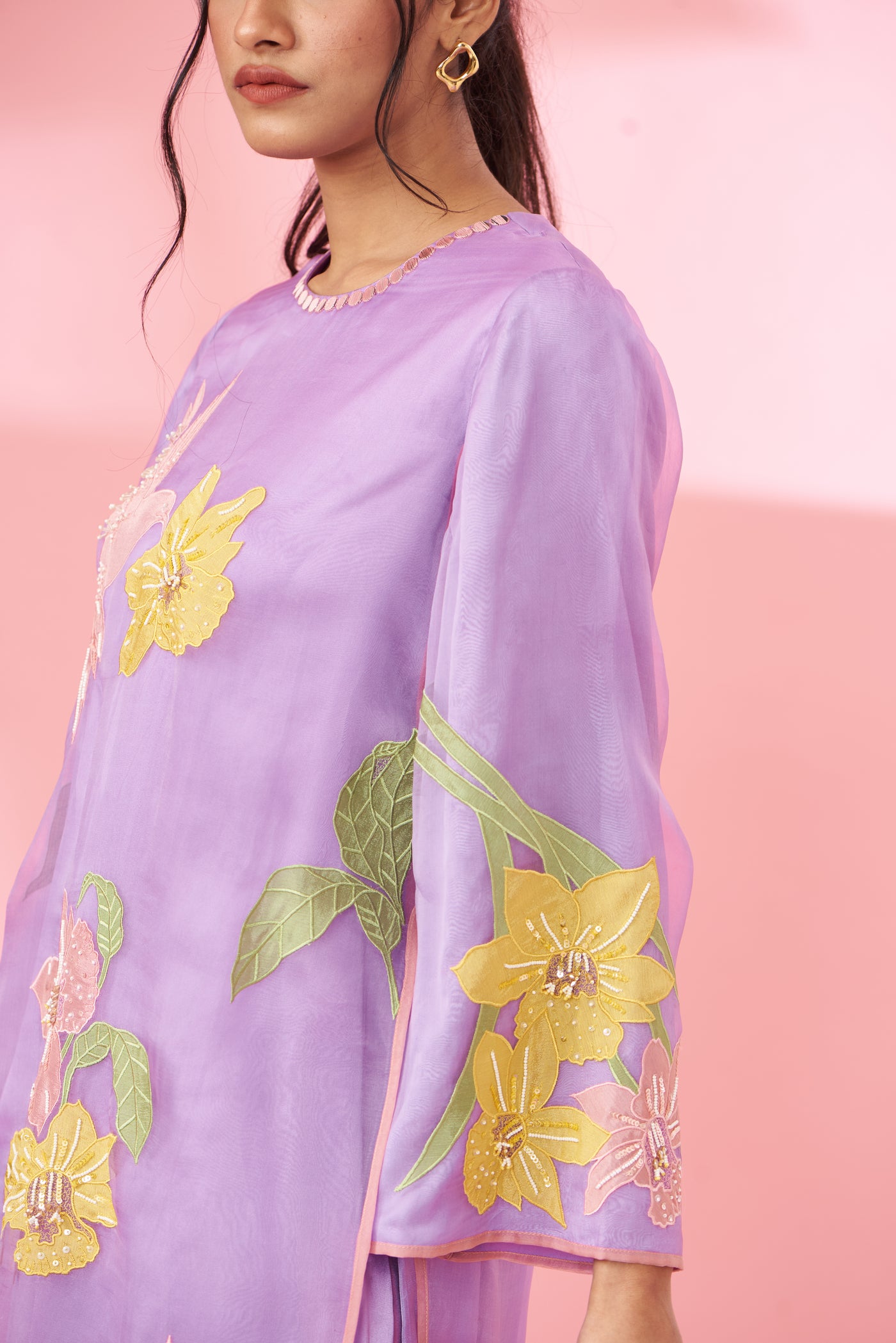 Colorful floral applique work and hand embroidered kurta set