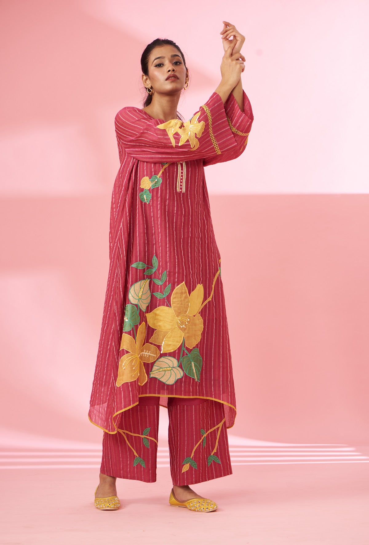 Colorful floral applique work and hand embroidered suit set