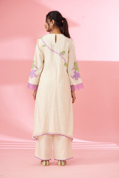 Colorful floral applique work and hand embroidered suit set