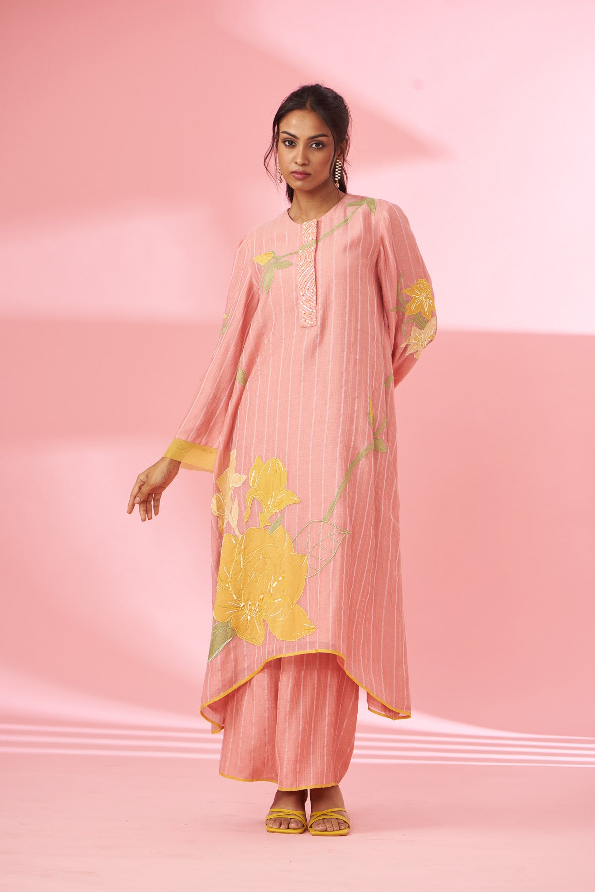 Colorful floral applique work and hand embroidered suit set