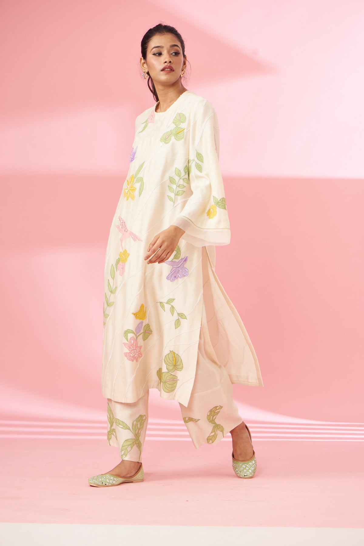 Colorful floral applique work and hand embroidered suit set
