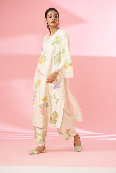 Colorful floral applique work and hand embroidered suit set