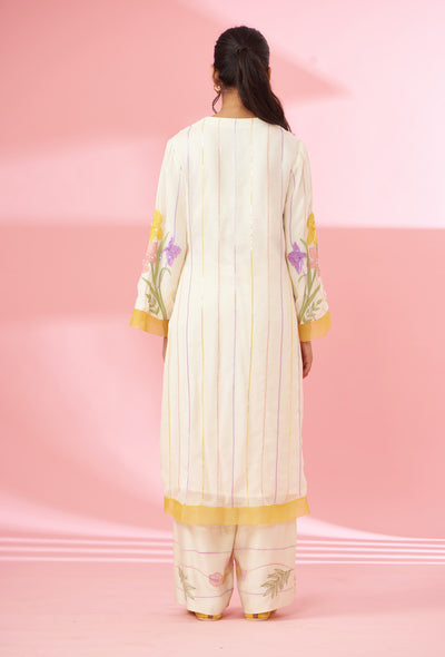 Colorful floral applique work and hand embroidered suit set