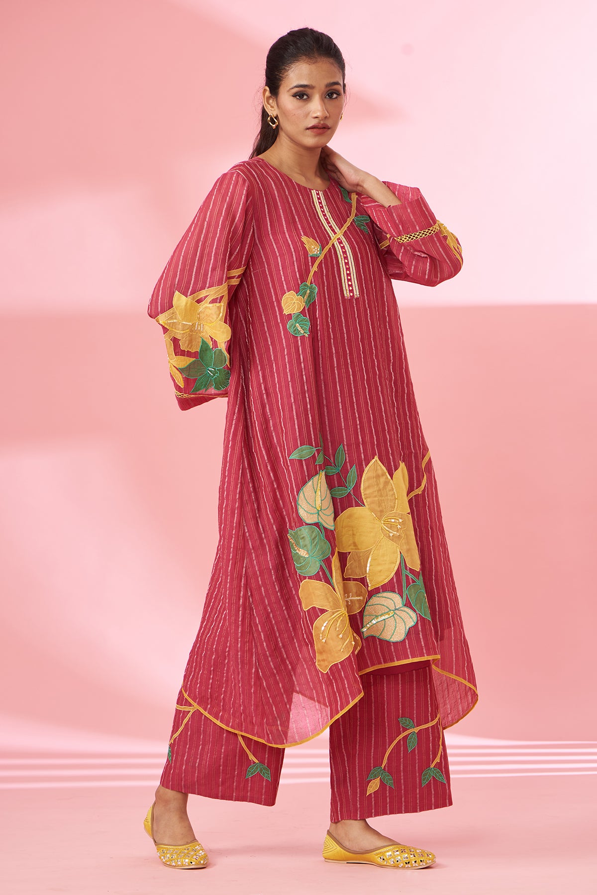 Colorful floral applique work and hand embroidered suit set